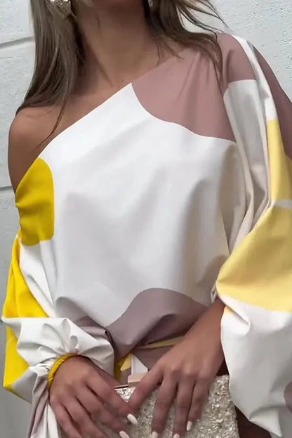 Conjunto de top holgado con mangas globo y falda con flecos con estampado único