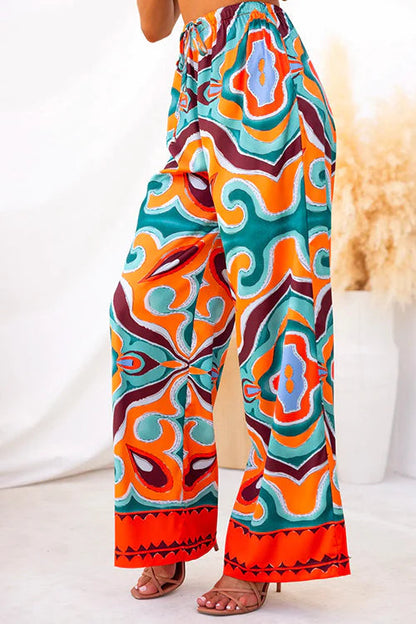Pantalones anchos con bolsillos y cintura elástica con estampado abstracto étnico de satén Oh So Chic