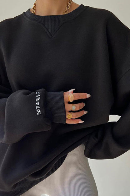 Sudadera versátil con cuello acanalado holgado
