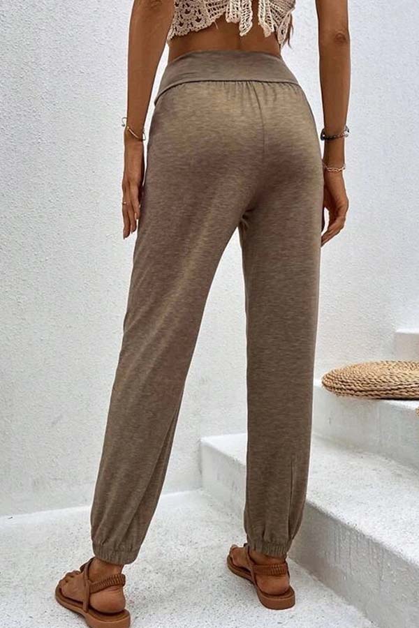 Pantalones casuales de cintura alta con bolsillos sueltos y temperamento