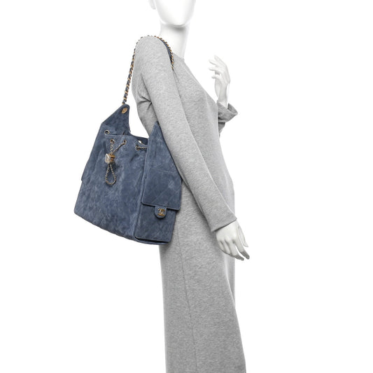 Suede Quilted Medium Chanel 25 Handbag Blue