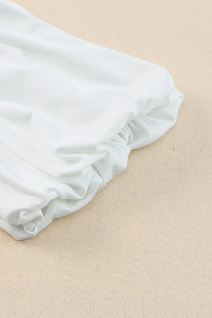 Blusa informal de color blanco liso con mangas abullonadas