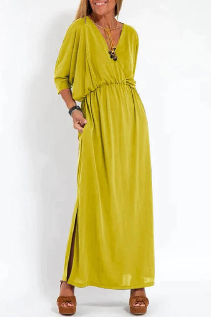 Vestido largo con abertura y bolsillos, manga corta y cintura elástica, comodidad suprema