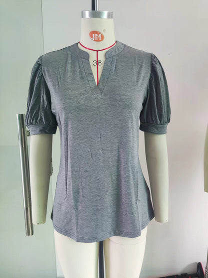 Camiseta holgada informal de verano con cuello en V y mangas abullonadas de color liso para mujer