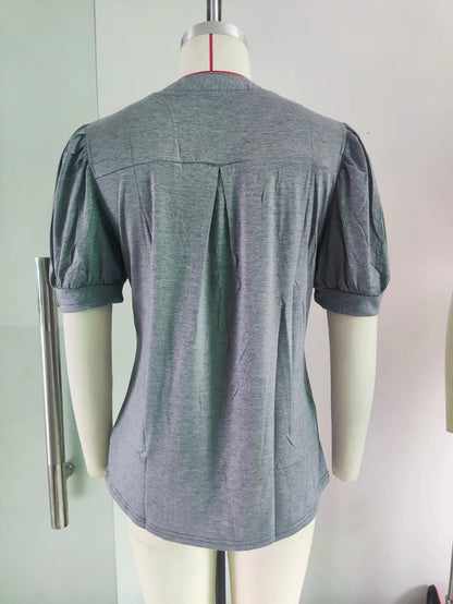 Camiseta holgada informal de verano con cuello en V y mangas abullonadas de color liso para mujer