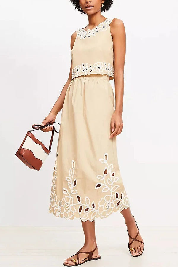 Camiseta de popelina con ojales florales y falda midi de cintura elástica y tiro alto para temporada de vacaciones