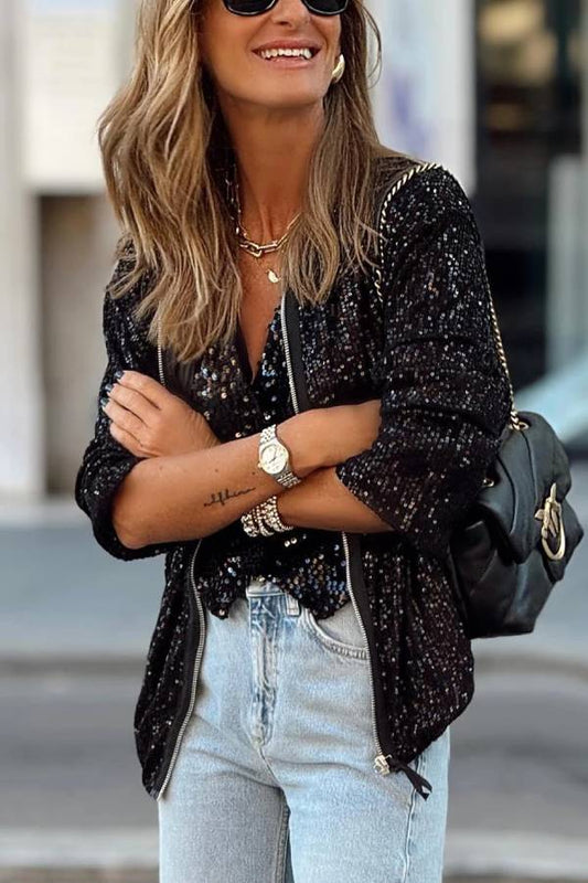 Chaqueta negra con cremallera y lentejuelas 