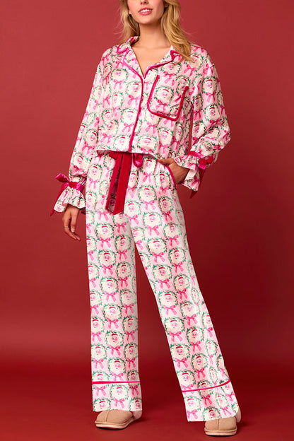 Conjunto de top de terciopelo con estampado navideño, manga larga, bolsillos y pantalones anchos con cintura elástica.