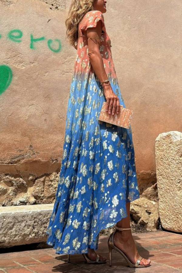 Vestido largo Evaluna con estampado de flores doradas en degradado tie-dye y manga corta