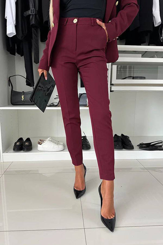 Pantalones cónicos de tiro alto con bolsillos que ofrecen una sensación de confianza