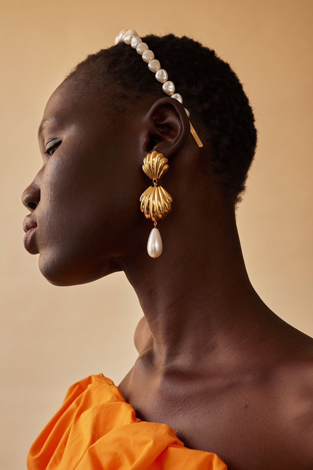 Pendientes de perlas con vieiras 