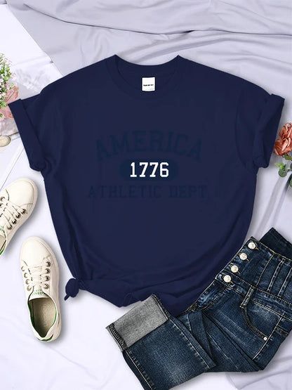 Camiseta deportiva informal con letras del Departamento Atlético América 1776 para mujer, estilo hip hop, suave y transpirable.