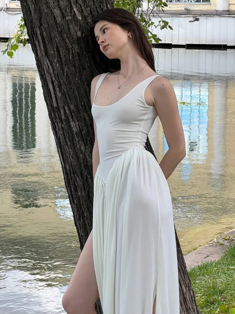 Elegante vestido largo ajustado elástico sin mangas para mujer, falda esponjosa con abertura en la espalda, vestido de noche ajustado para fiestas y vacaciones.