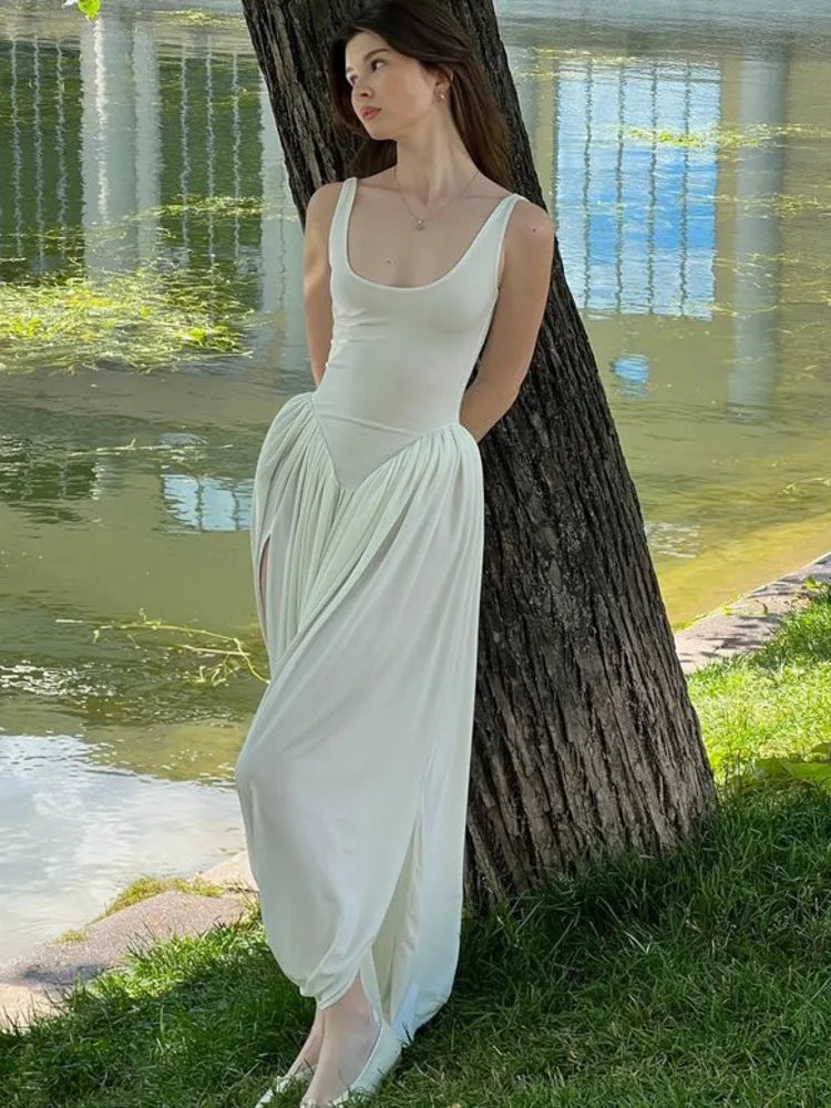 Elegante vestido largo ajustado elástico sin mangas para mujer, falda esponjosa con abertura en la espalda, vestido de noche ajustado para fiestas y vacaciones.