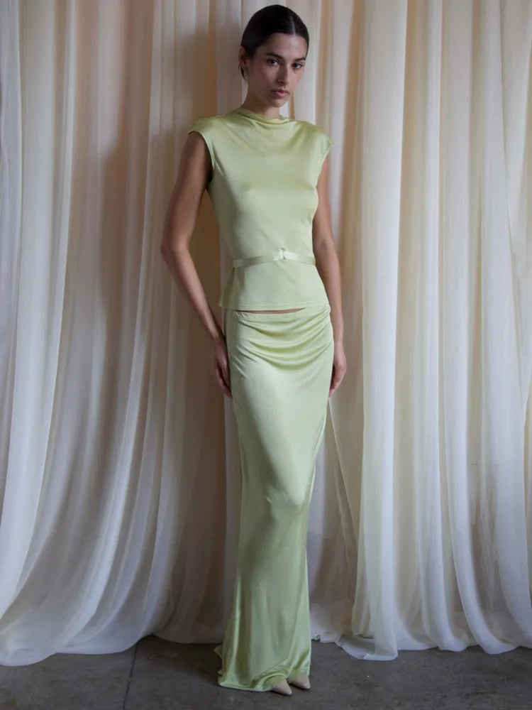 Elegante conjunto de top y falda ajustados con cuello redondo sin mangas para mujer, moda Otoño Invierno 2025, conjunto de fiesta de dos piezas.