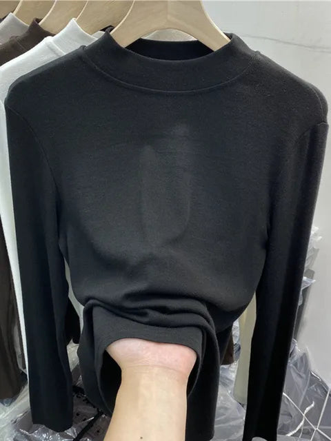 Camiseta básica blanca de algodón puro de alta calidad para mujer, elegante top ajustado de cuello alto y manga larga.