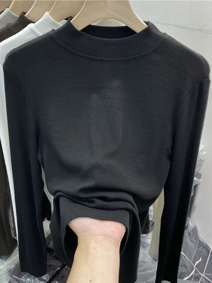 Camiseta básica blanca de algodón puro de alta calidad para mujer, elegante top ajustado de cuello alto y manga larga.