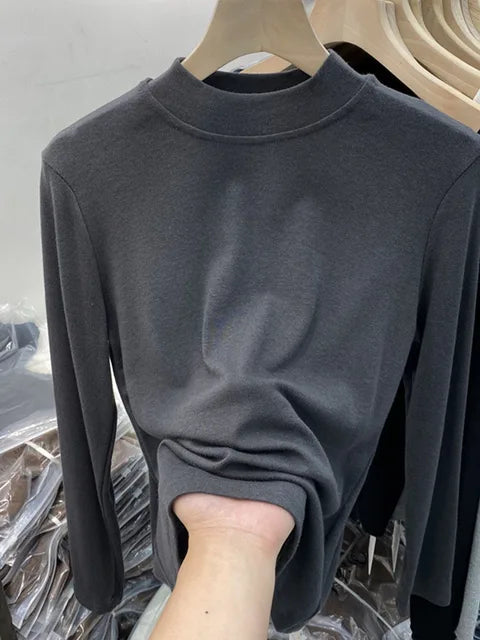Camiseta básica blanca de algodón puro de alta calidad para mujer, elegante top ajustado de cuello alto y manga larga.