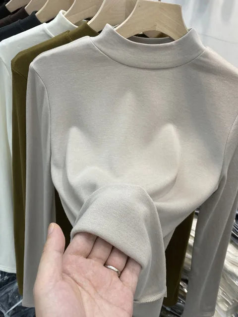 Camiseta básica blanca de algodón puro de alta calidad para mujer, elegante top ajustado de cuello alto y manga larga.