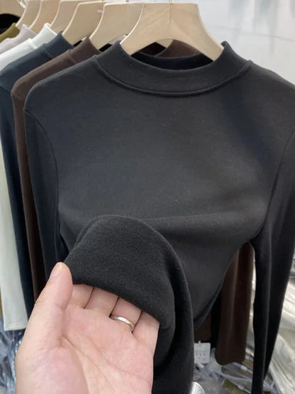 Camiseta básica blanca de algodón puro de alta calidad para mujer, elegante top ajustado de cuello alto y manga larga.