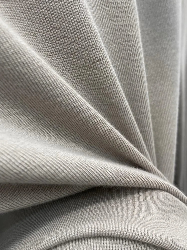 Camiseta básica blanca de algodón puro de alta calidad para mujer, elegante top ajustado de cuello alto y manga larga.