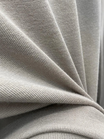 Camiseta básica blanca de algodón puro de alta calidad para mujer, elegante top ajustado de cuello alto y manga larga.
