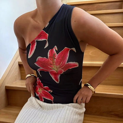Tops ajustados con estampado floral para mujer, ropa de resort, camisetas gráficas, verano 2025, camiseta informal de un solo hombro con espalda descubierta