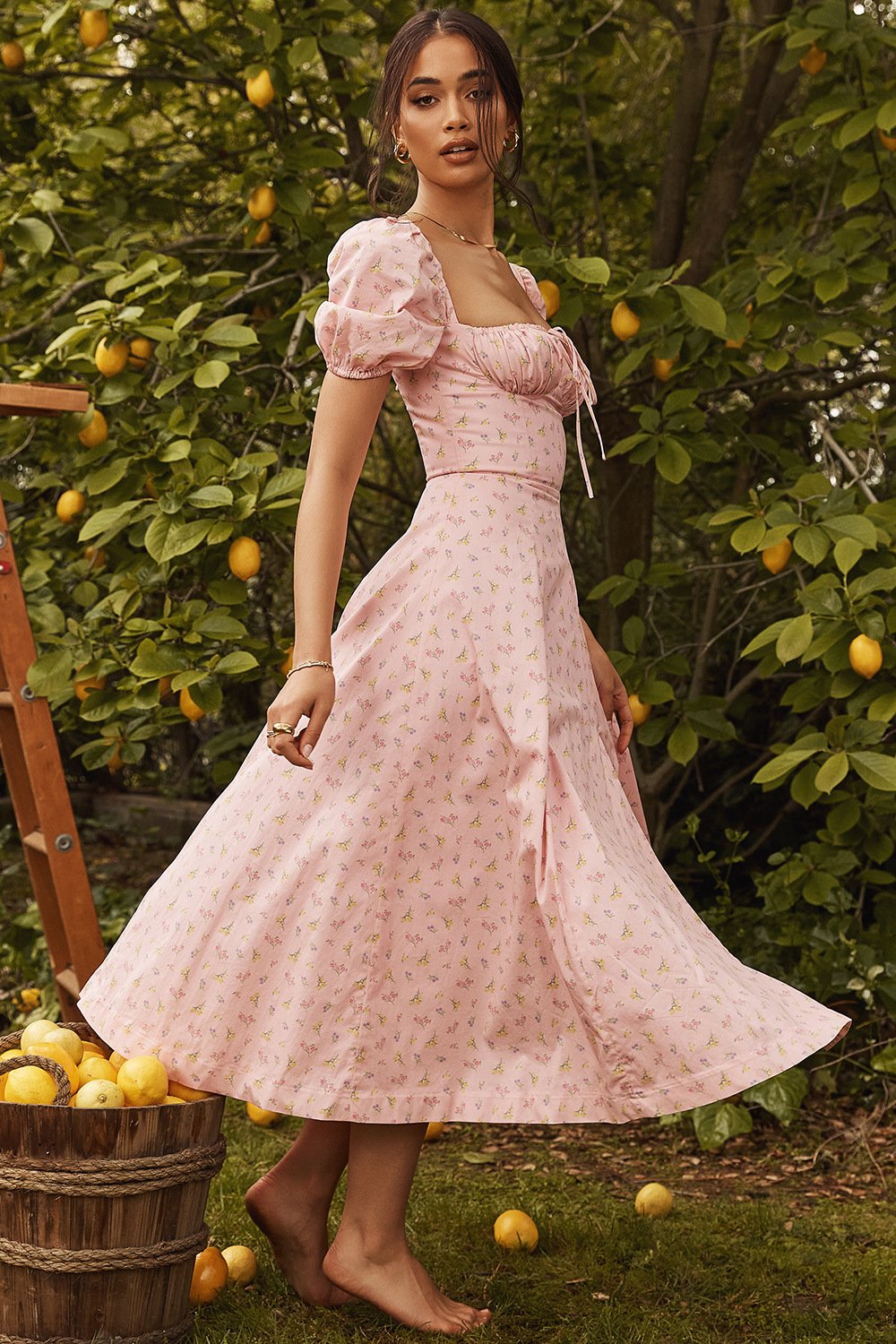 Vestido midi con abertura y mangas abullonadas 