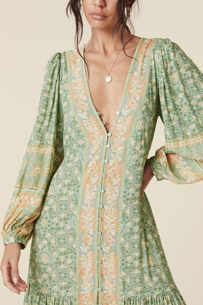Vestido midi drapeado con escote en V y manga larga floral verde 