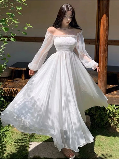 Elegantes vestidos de playa para vacaciones de verano para mujer, color blanco liso, con mangas abullonadas, cuello oblicuo, hombros descubiertos, vestidos de gasa de moda coreana.