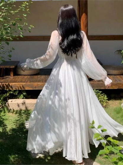 Elegantes vestidos de playa para vacaciones de verano para mujer, color blanco liso, con mangas abullonadas, cuello oblicuo, hombros descubiertos, vestidos de gasa de moda coreana.