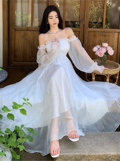 Elegantes vestidos de playa para vacaciones de verano para mujer, color blanco liso, con mangas abullonadas, cuello oblicuo, hombros descubiertos, vestidos de gasa de moda coreana.