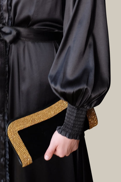 Bolso de mano Kama con ribete de diamantes 