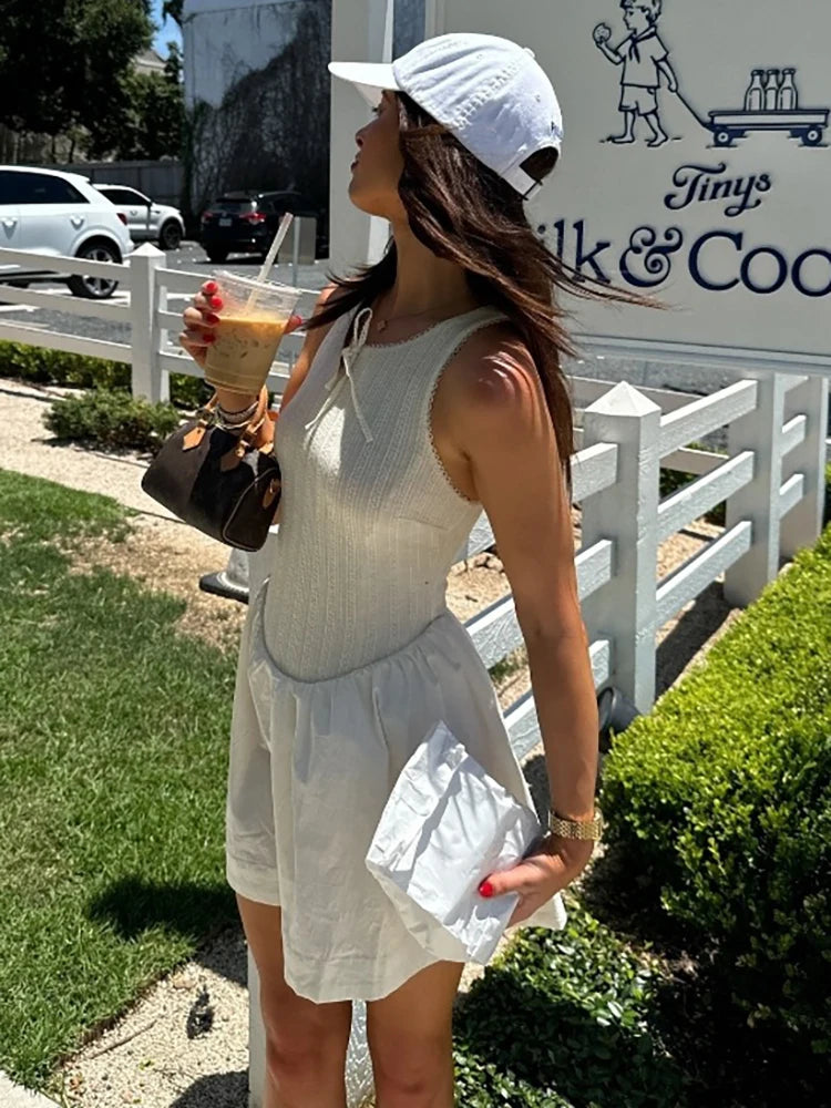 Fantoye - Vestido corto femenino de verano sin mangas, corte en A, sexy, con espalda descubierta, cuello redondo, holgado e informal