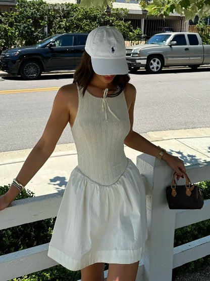 Fantoye - Vestido corto femenino de verano sin mangas, corte en A, sexy, con espalda descubierta, cuello redondo, holgado e informal