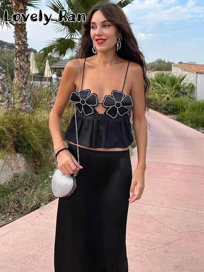 Top corto elegante con estampado floral negro a la moda para mujer, camisola Y2K con tirantes y espalda descubierta, ropa de calle elegante y sexy sin mangas para mujer