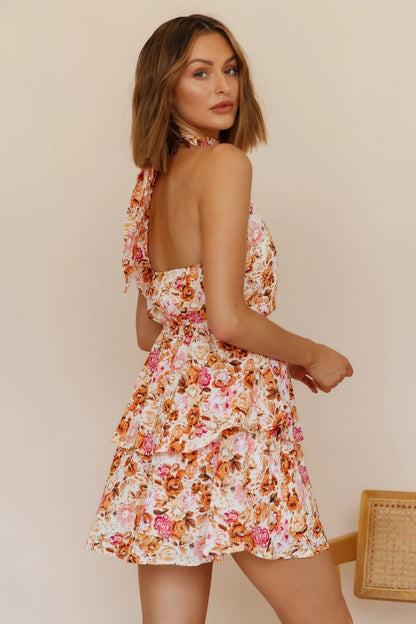 Minivestido floral con cuello halter, espalda descubierta y dobladillo con volantes 