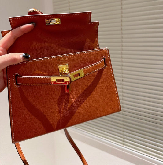 H KELLY TOGO ORANGE GOLD HARDWARE 20CM