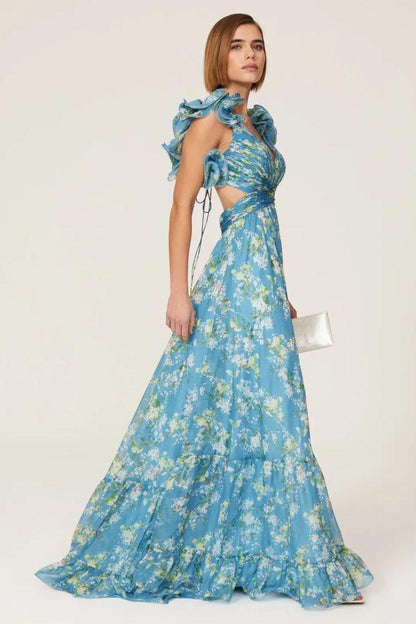 Vestido largo azul con escote en V y volantes recortados con flores 