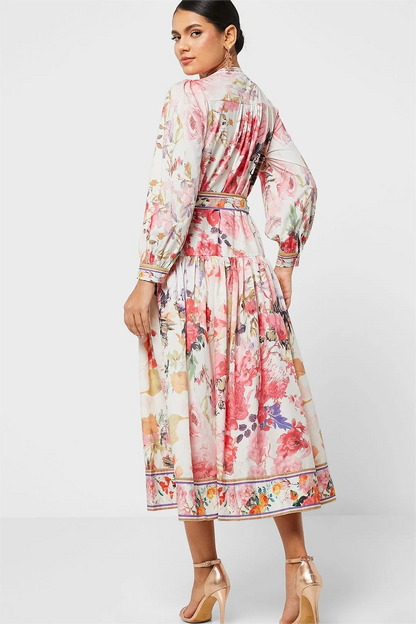 Vestido midi floral de manga larga, cuello redondo, botones y cordones 