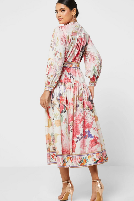 Vestido midi floral de manga larga, cuello redondo, botones y cordones 
