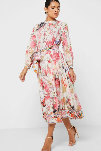 Vestido midi floral de manga larga, cuello redondo, botones y cordones 