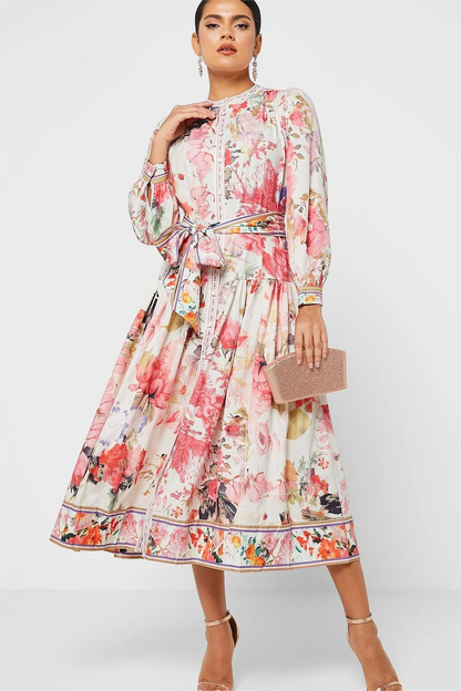 Vestido midi floral de manga larga, cuello redondo, botones y cordones 