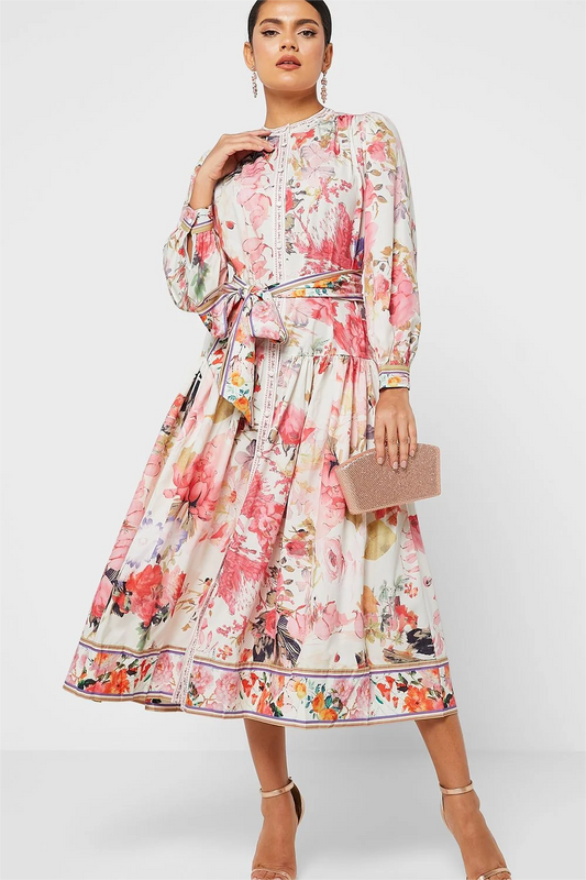 Vestido midi floral de manga larga, cuello redondo, botones y cordones 