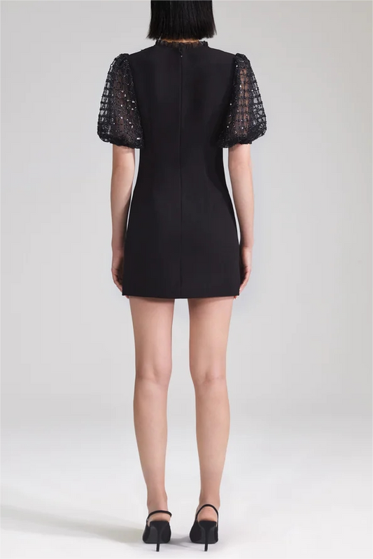 Minivestido negro de crepé con lentejuelas y mangas abullonadas 