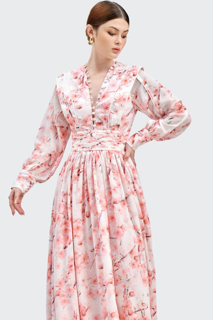 Vestido midi de manga larga con estampado floral y botonadura sencilla 