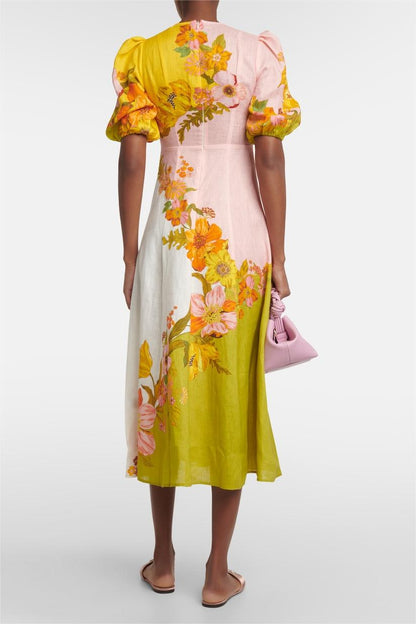 Vestido midi floral con escote redondo y mangas abullonadas 