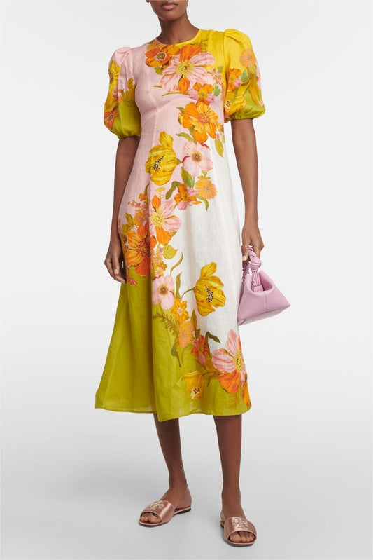Vestido midi floral con escote redondo y mangas abullonadas 