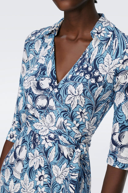 Vestido midi cruzado con encaje y mangas a media pierna con estampado floral 
