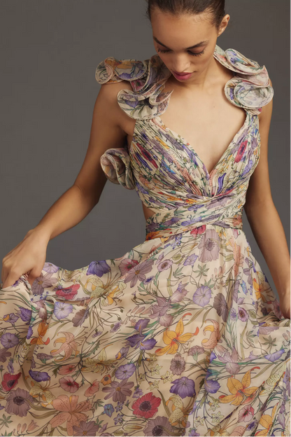 Vestido largo floral plisado con espalda descubierta y cordones 
